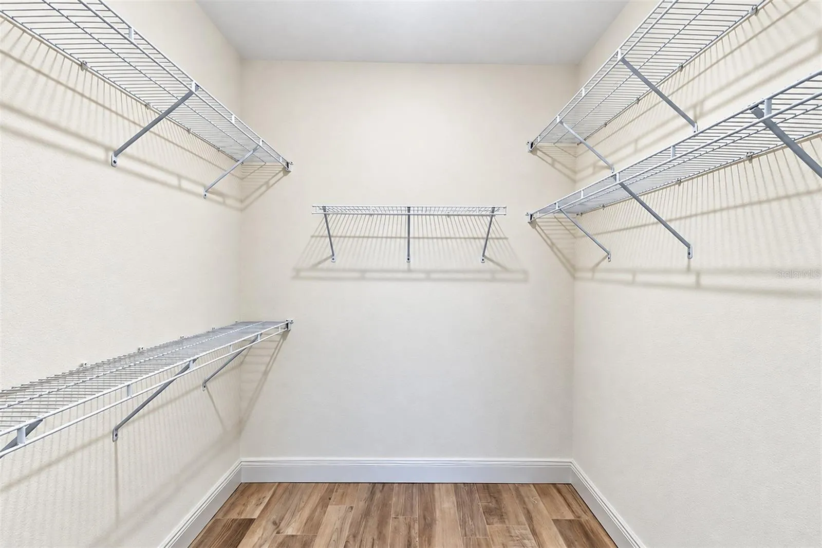 Second floor primary bedroom walk in closet