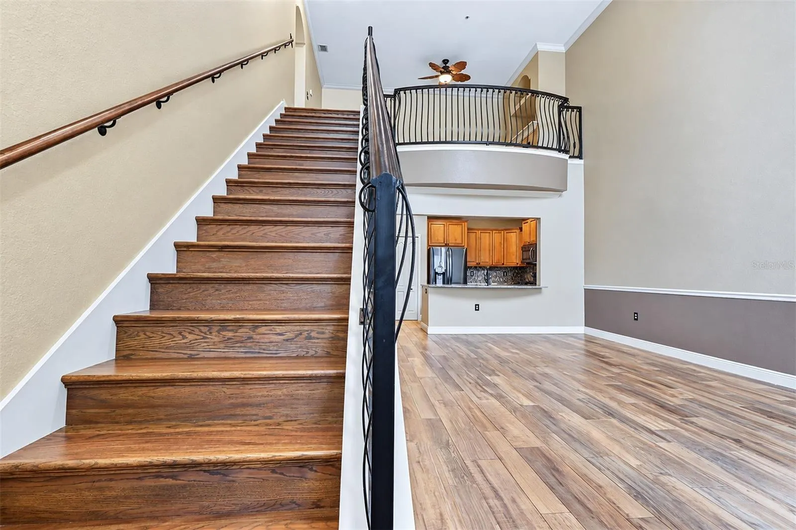 Stairs to the loft and second primary bedroom and bath