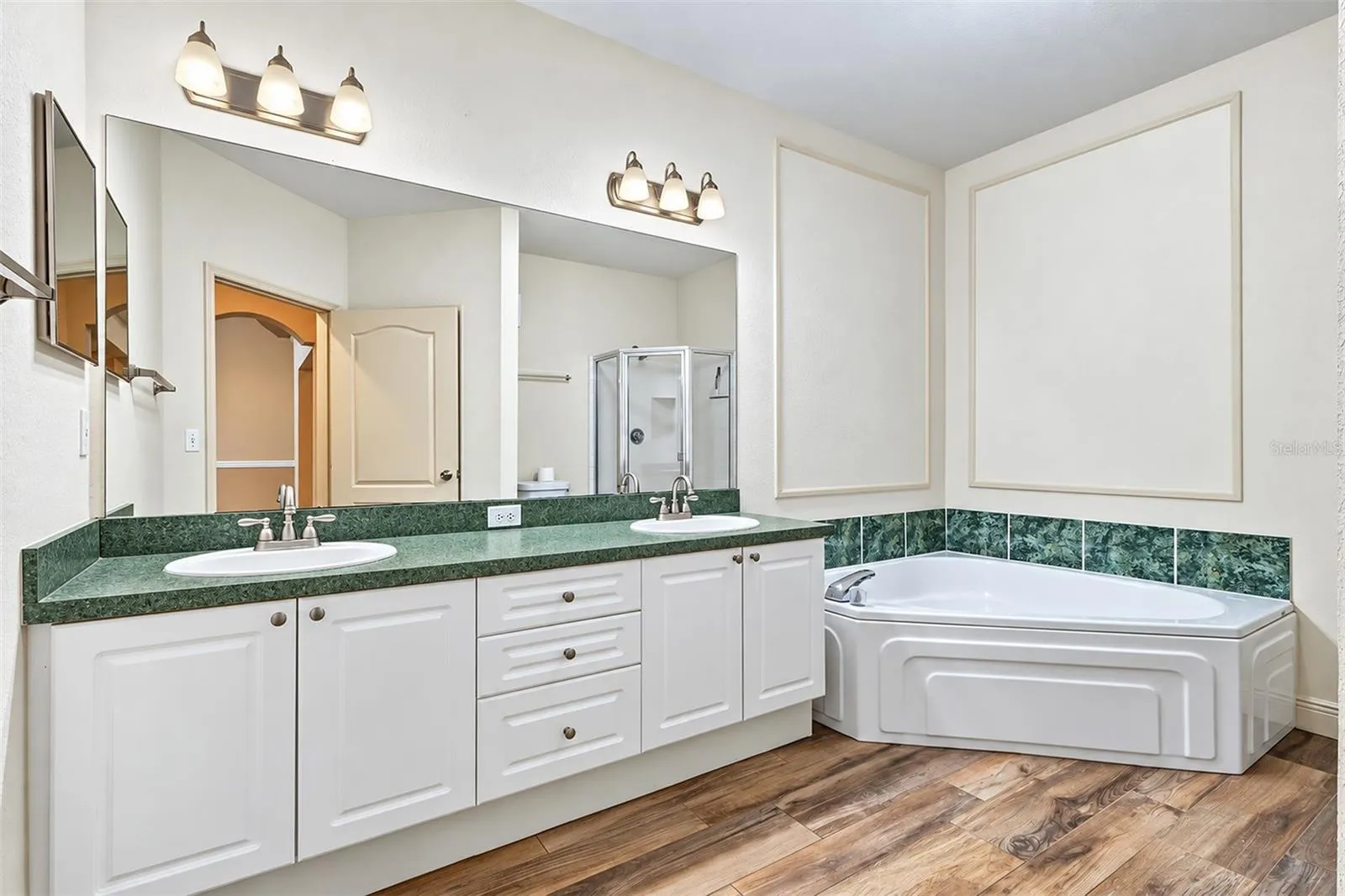 First floor bath with double vanity and garden tub