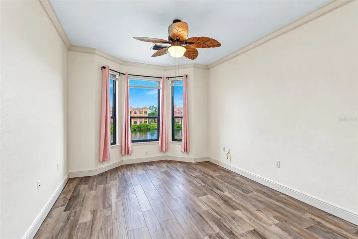 Second floor primary bedroom with bay window