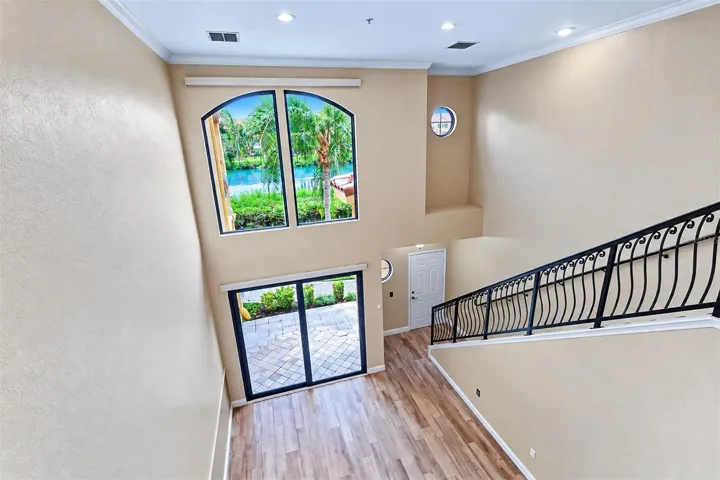 View of the living and dining room areas from the loft