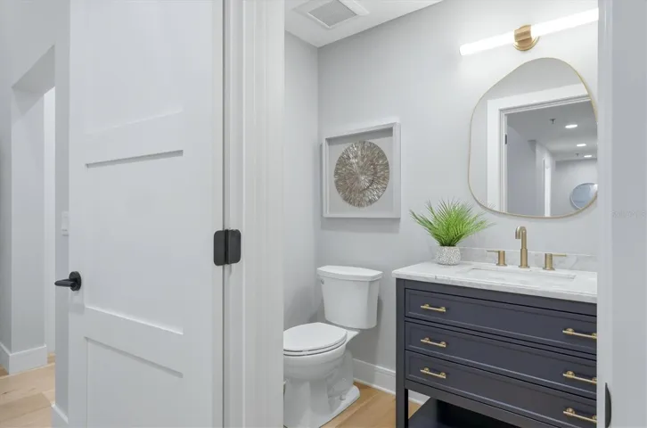 Half Bath with Carrera Marble Vanity