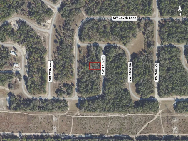 Neighborhood aerial, lot outlined in red