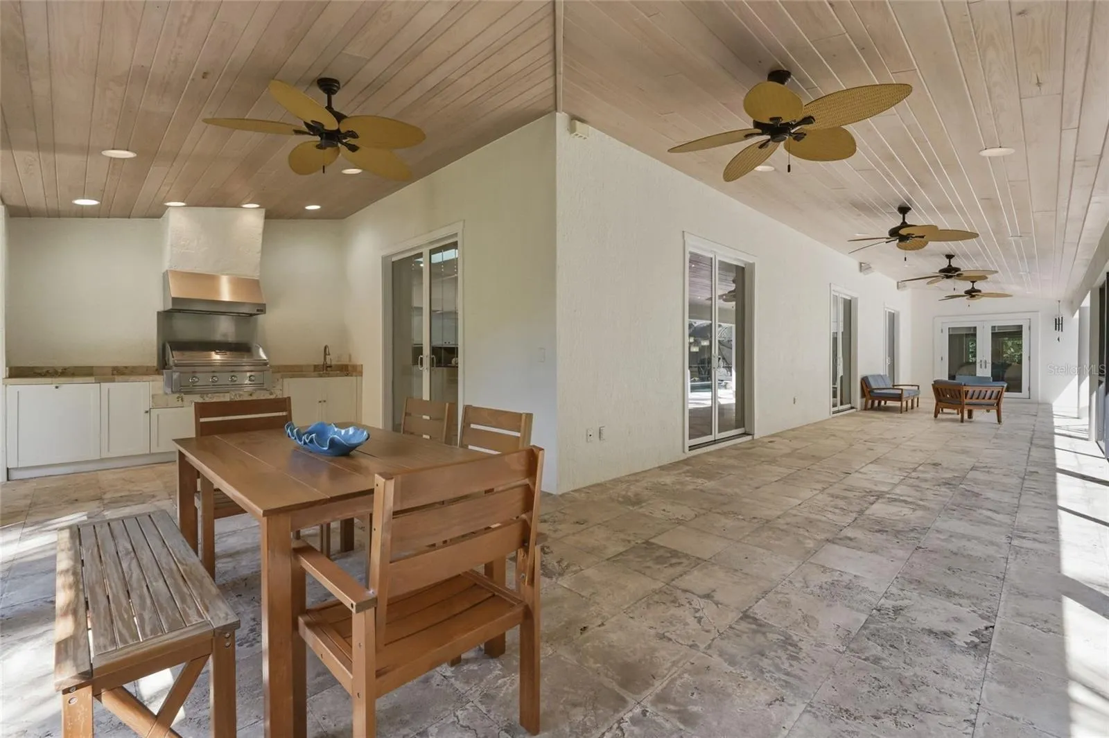 Oversized Covered Lanai that wraps around part of house