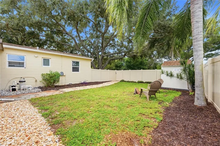 Generous backyard! A larger gate could be added by a new owner to allow for RV or boat parking.