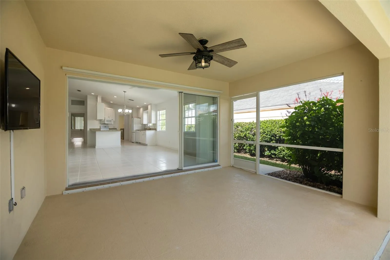 Back patio with view of Living room and Kitchen.
