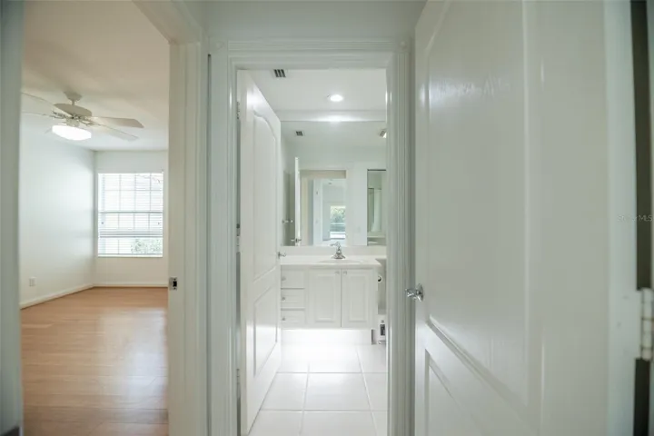 Ensuite guest bath with a tub.