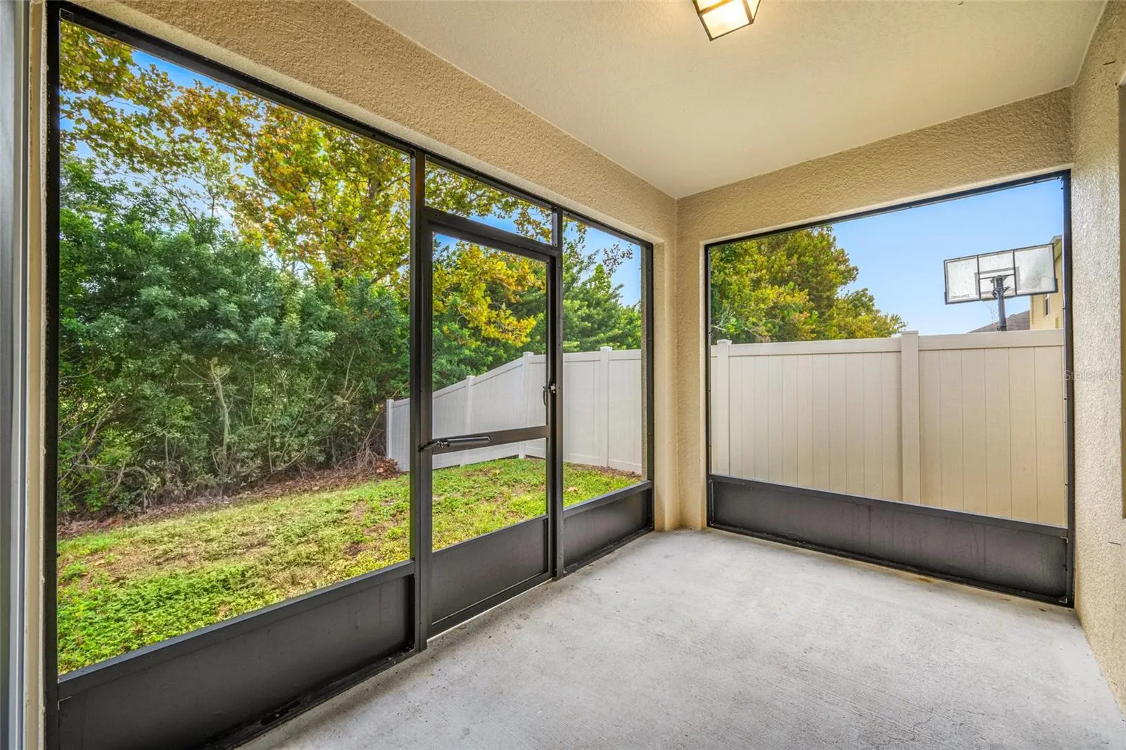 Screened-in back porch