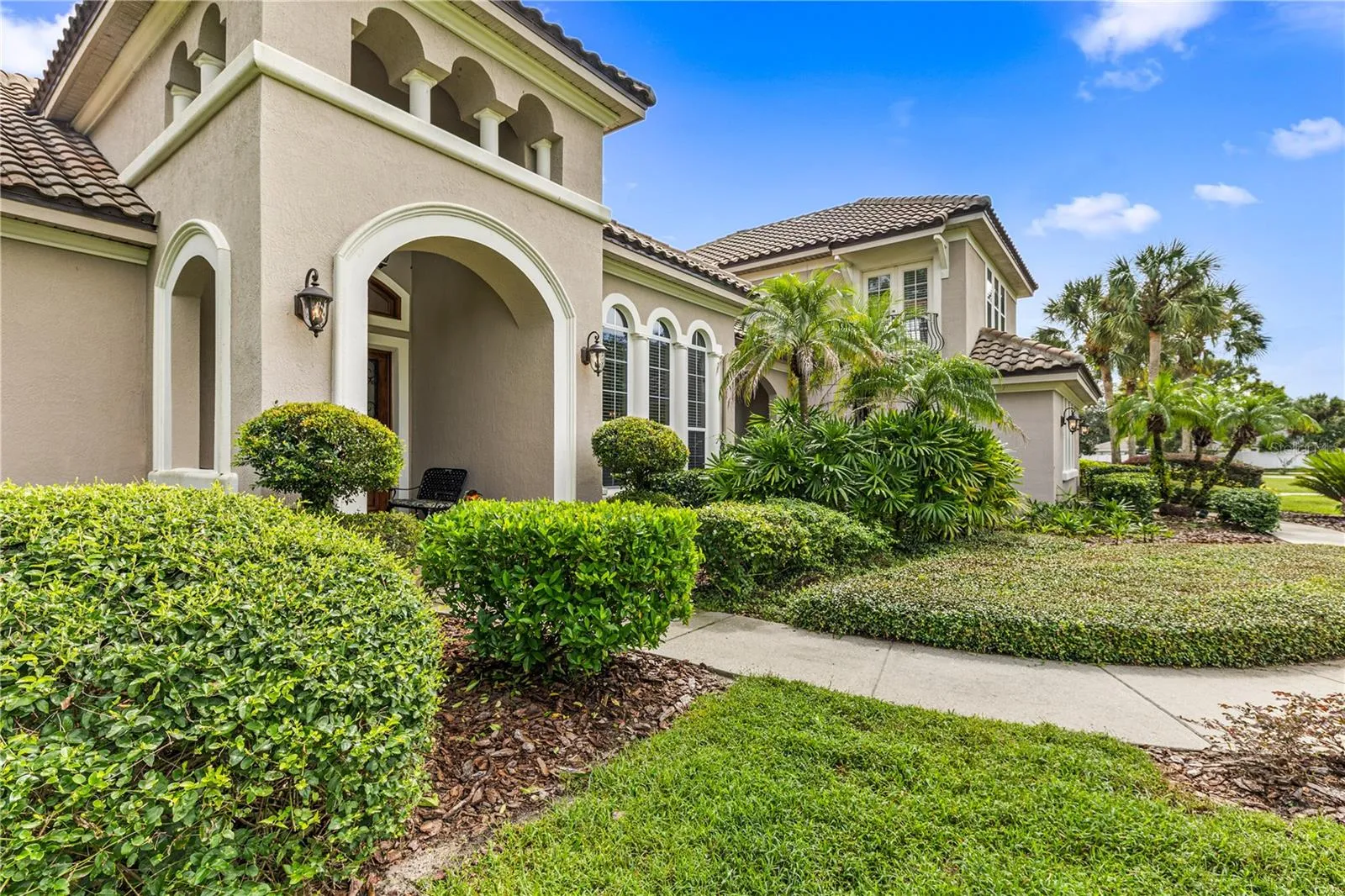 ENTRANCE VIEW W FRONT LANDSCAPING AND WALKWAY