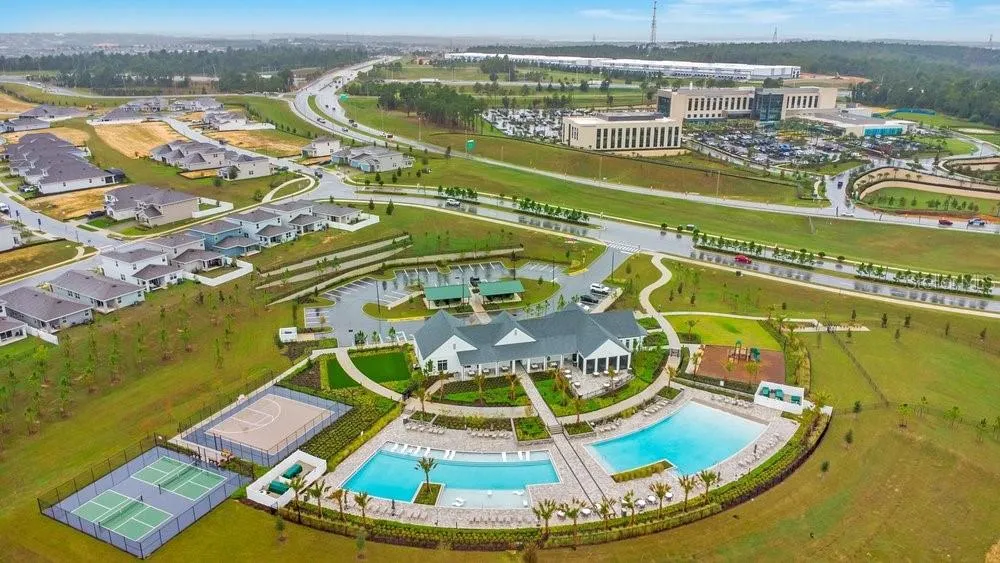 Amenities Center with AdventHealth Hospital in the distance