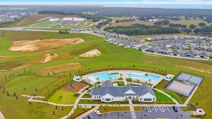 Amenities Center with Minneola Horizon Academy and Lake Apopka in the Distance