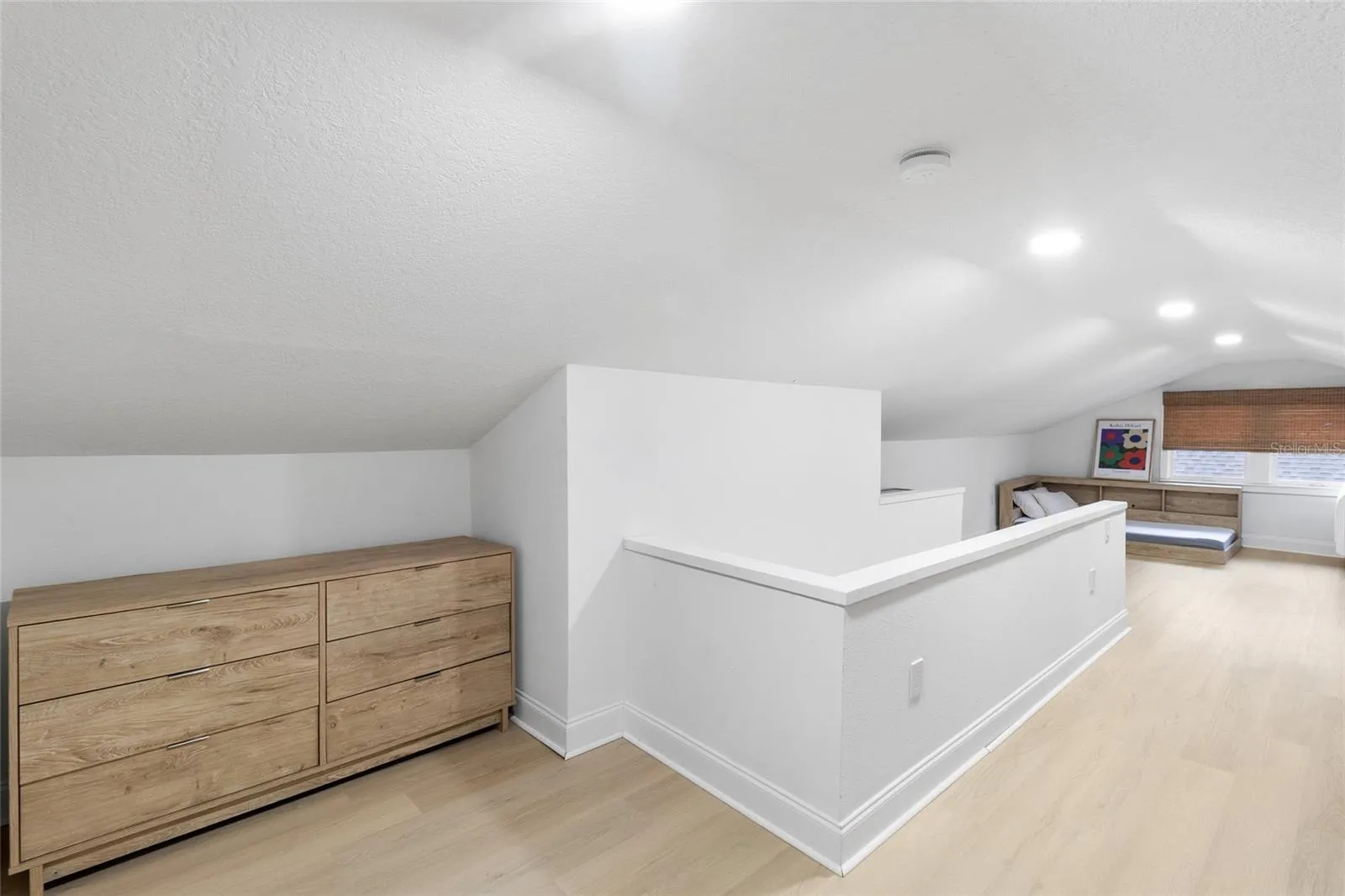 Upstairs loft bedroom! Recessed lighting! LVP floors and closet too!
