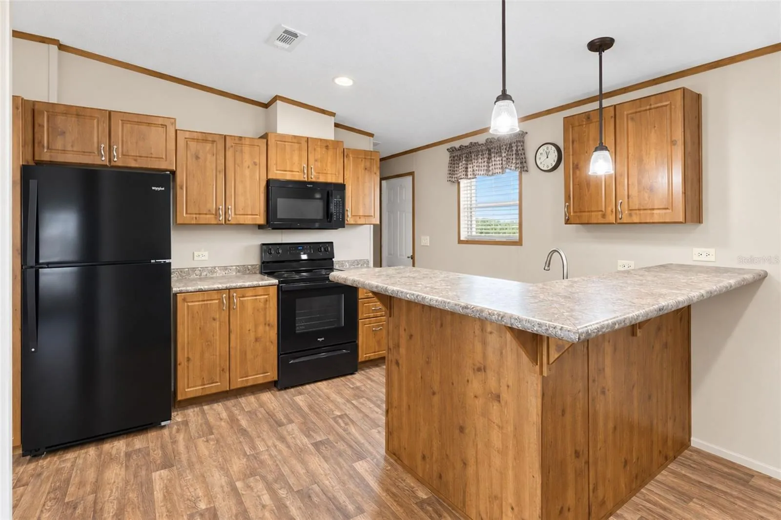 There's room for a couple of bar stools at the breakfast bar