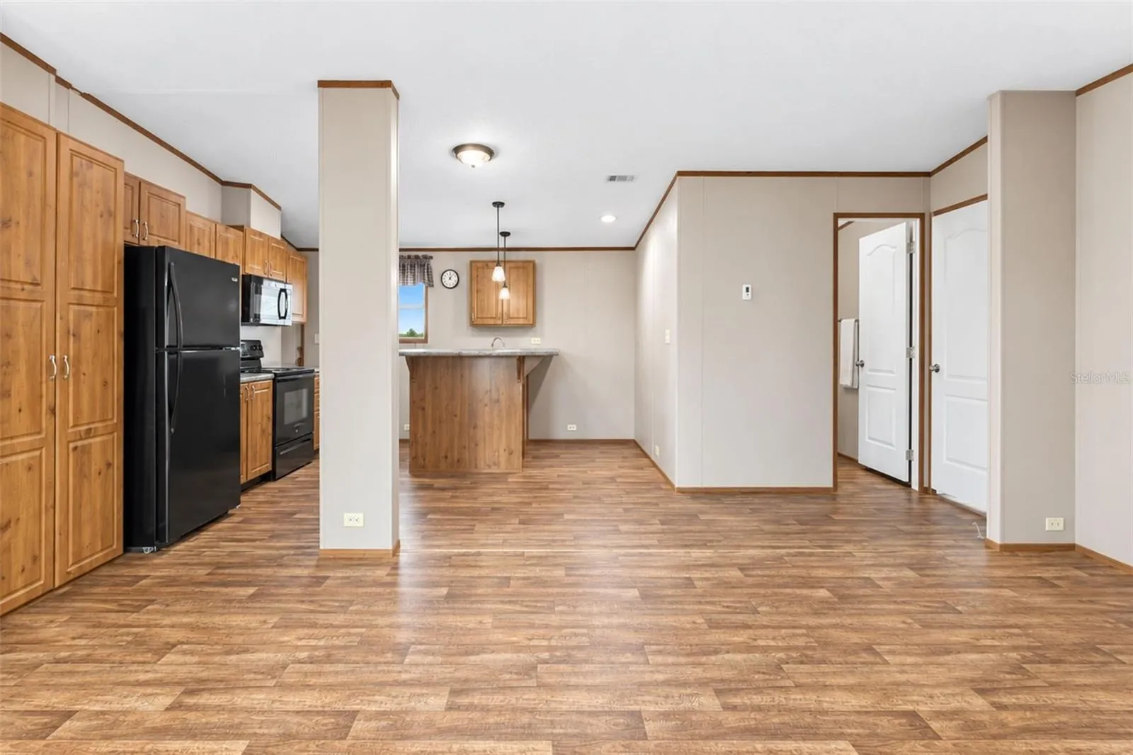 Looking toward kitchen from dining area