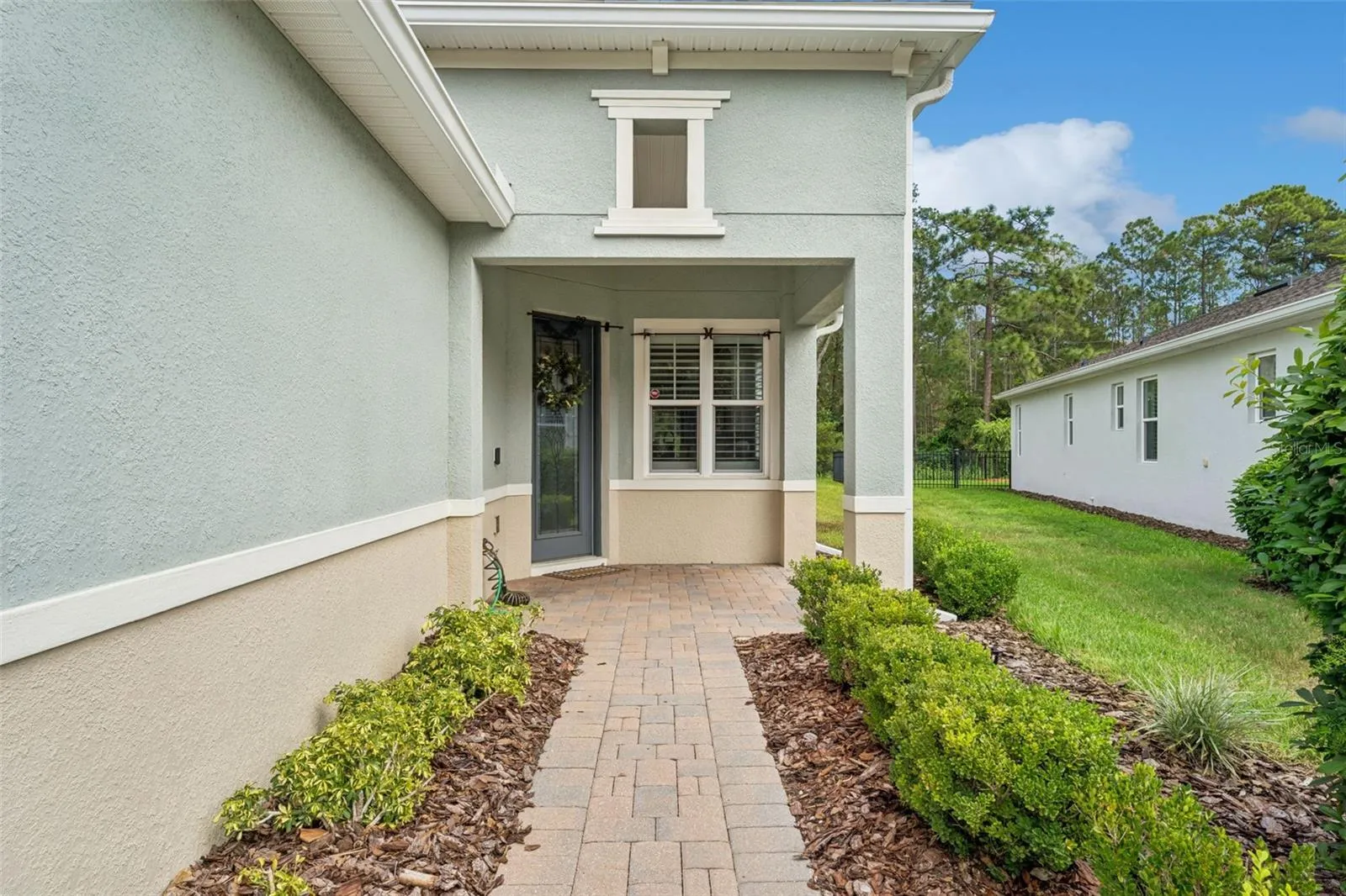 Front entry walkway w/ front porch &amp; leaded glass front door
