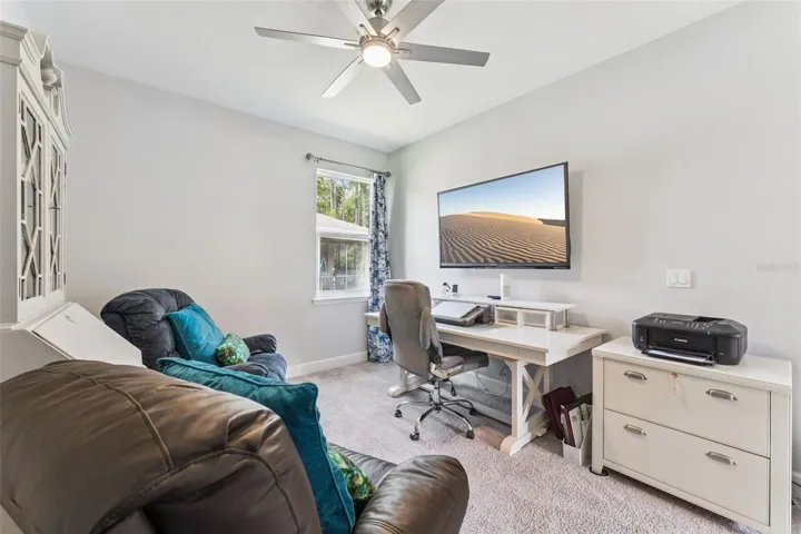 13' x 10'6" Den/Office w/ a ceiling fan