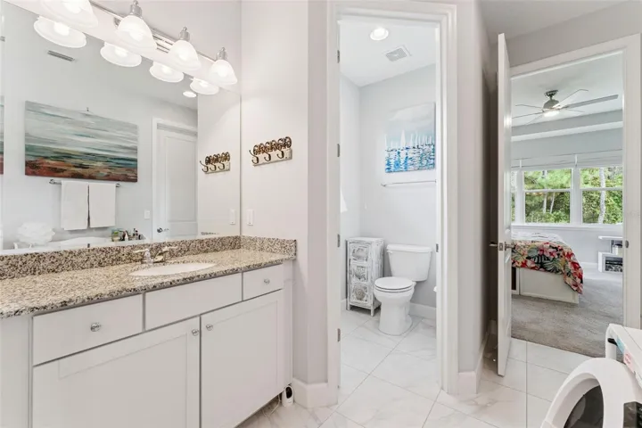 Primary Bathroom w/ door to bedroom