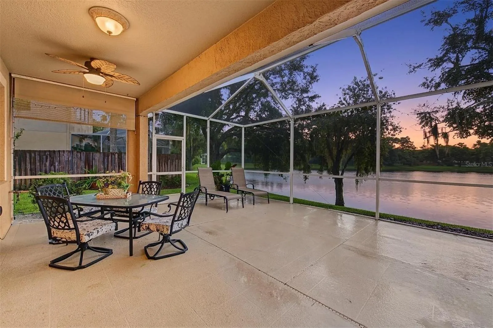 Covered and screened back lanai - great pond view