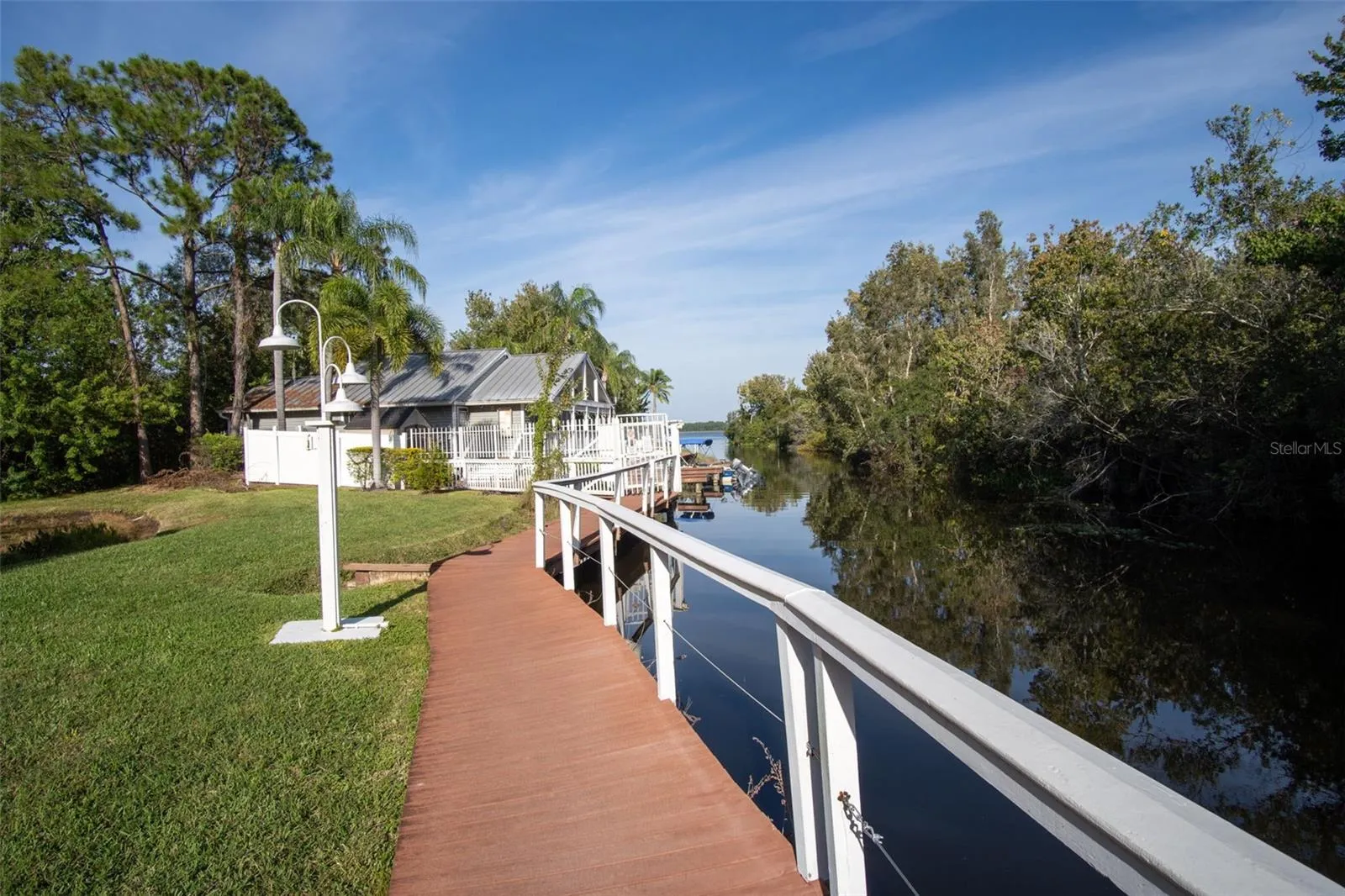 Walkway to Clubhouse, Pool and Firepit, Boat Dock, Fishing Pier, Cleaning Station &amp; Kayak Storage!