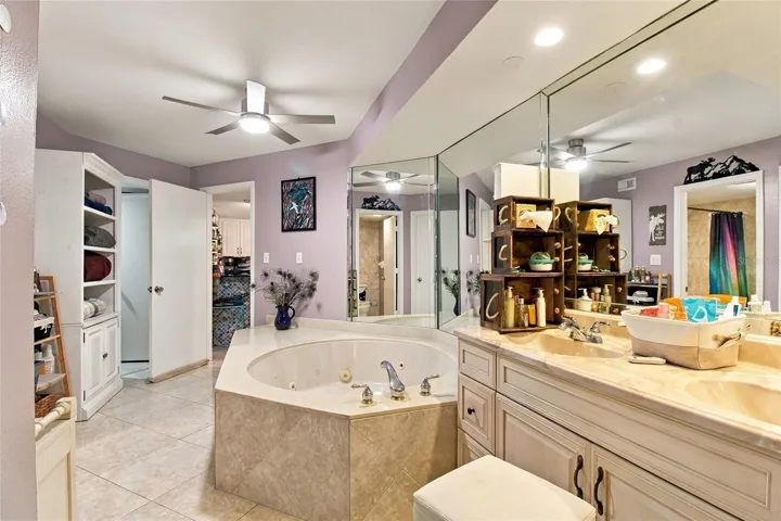 Primary Ensuite Bath - two walk-in closets and linen closet