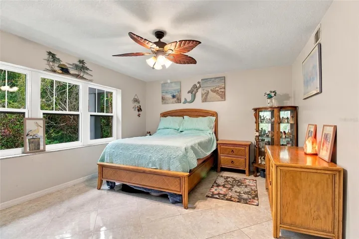 Primary Bedroom with Lush Nature Views