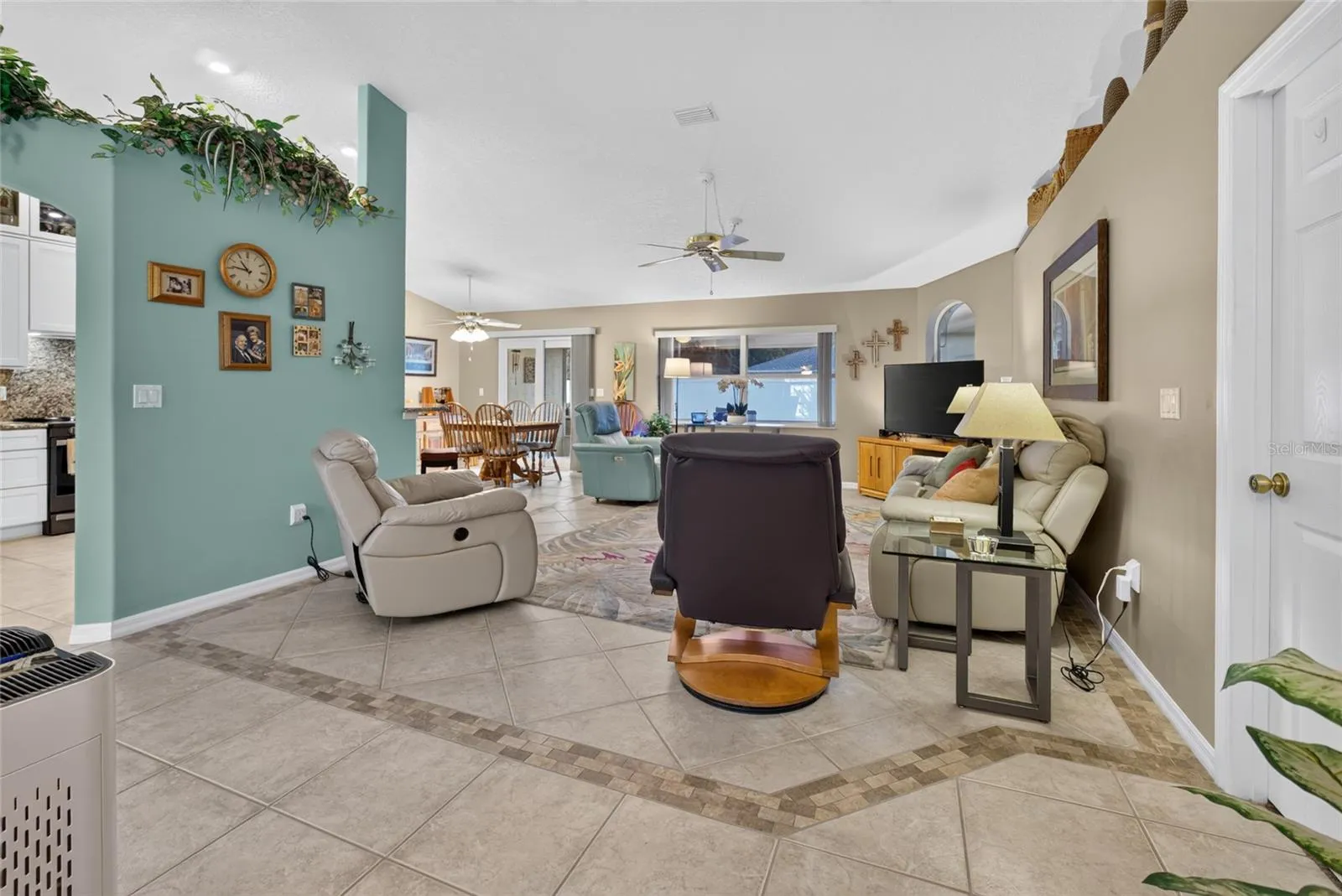 Open floor plan to living and dining rooms
