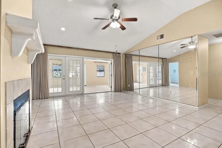 Living room overlooking enclosed Florida Room