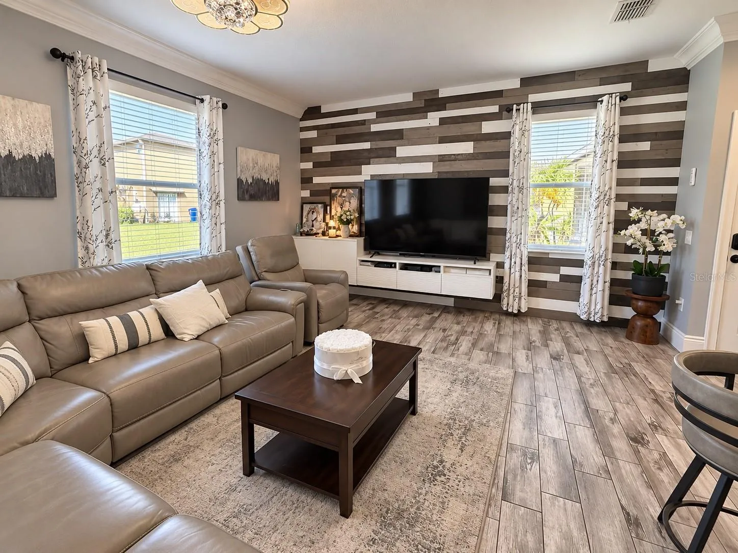 Spacious living room with decorative accent wall