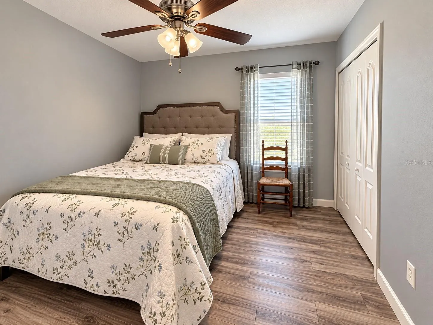 Comfortable secondary bedroom with natural light