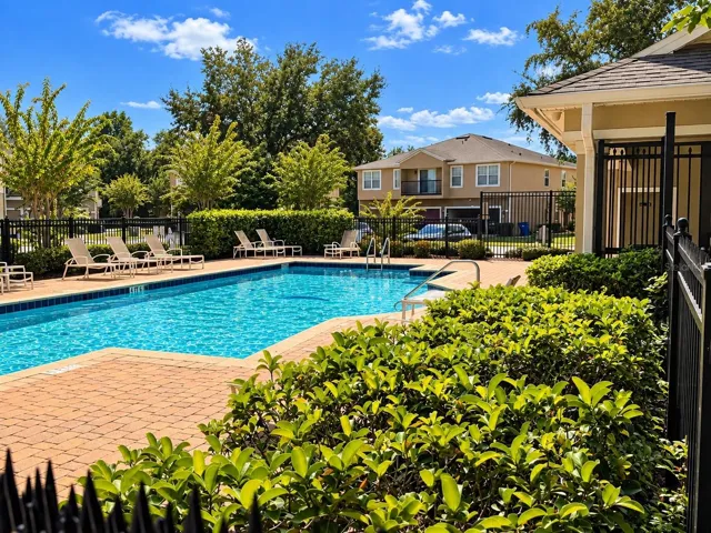 Another view of the community pool and surrounding amenities.