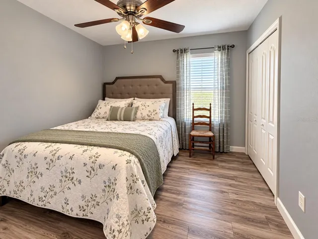 Comfortable secondary bedroom with natural light