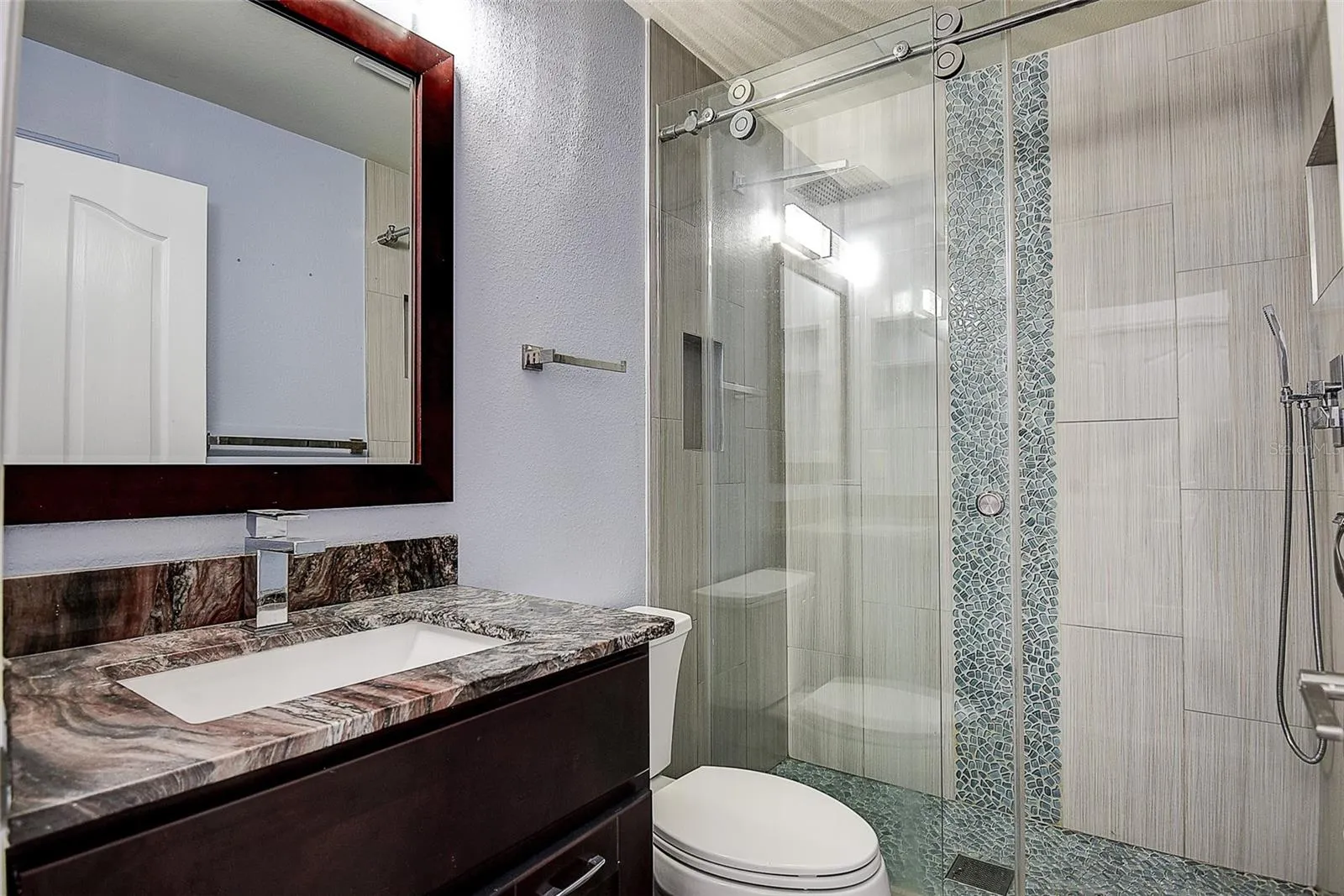 2nd Bath with granite, all wood cabinets and glass shower