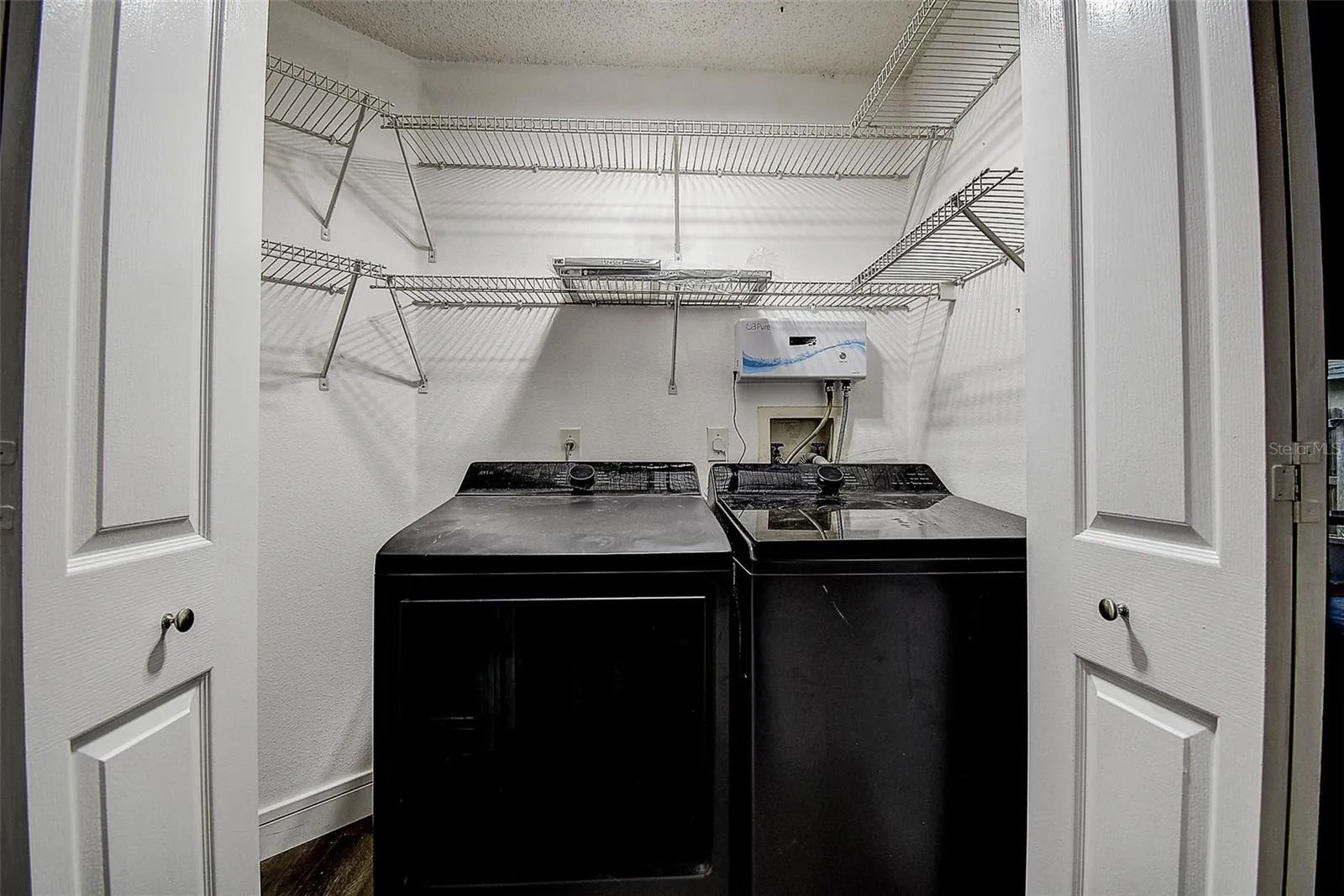 Laundry Closet in hallway near 2nd bath