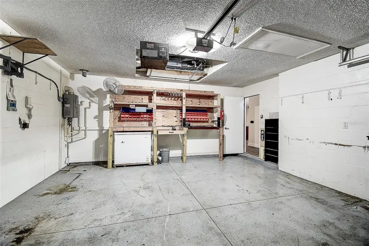 Garage with built-in work bench.