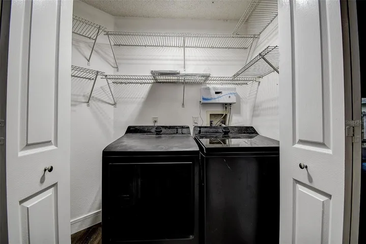 Laundry Closet in hallway near 2nd bath