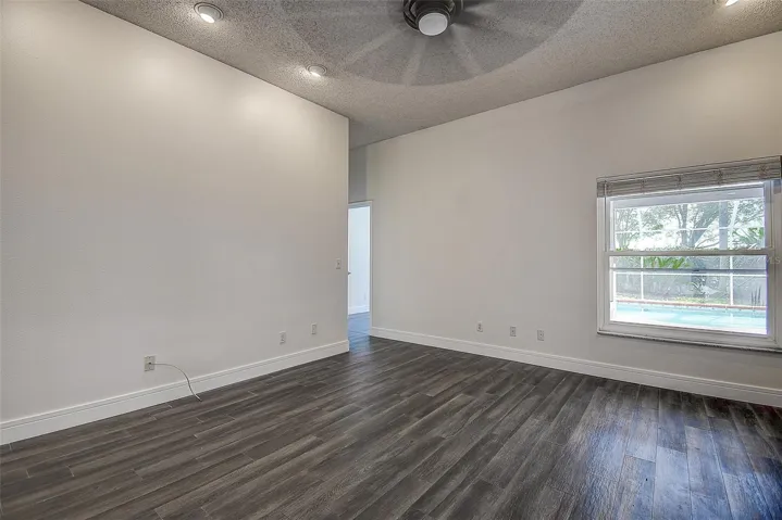 Family Room leading to the pool and Primary Bedrooms