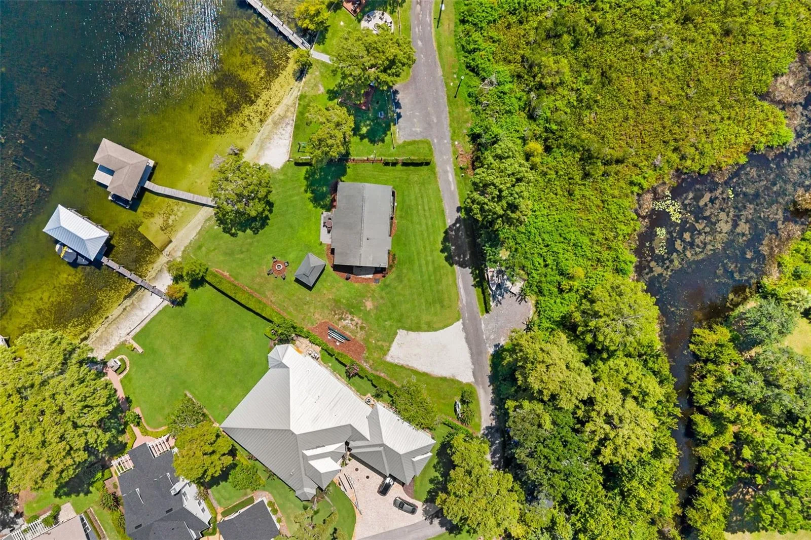 Rare Lake Sheen lakefront estate opportunity on the Butler Chain of Lakes! An exceptional opportunity to build a custom luxury lakefront residence on one of the most compelling properties along Lake Cottage Lane.
