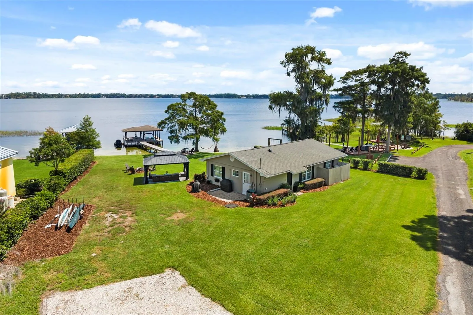 Rare Lake Sheen lakefront estate opportunity on the Butler Chain of Lakes! An exceptional opportunity to build a custom luxury lakefront residence on one of the most compelling properties along Lake Cottage Lane.
