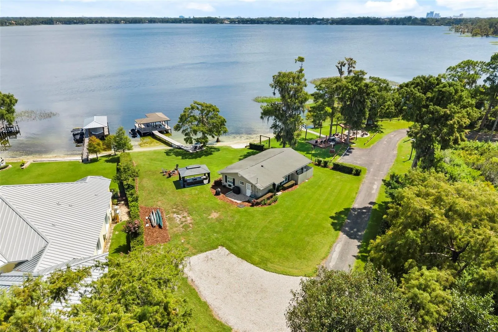 Rare Lake Sheen lakefront estate opportunity on the Butler Chain of Lakes! An exceptional opportunity to build a custom luxury lakefront residence on one of the most compelling properties along Lake Cottage Lane.