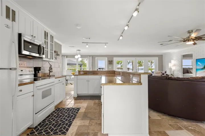 An existing two-bedroom, 1.5-bath cottage currently occupies the property.
