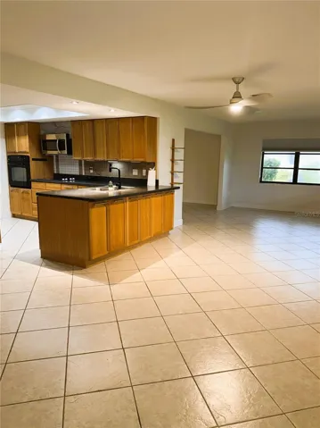 kitchen and extra room for eat in kit or open office