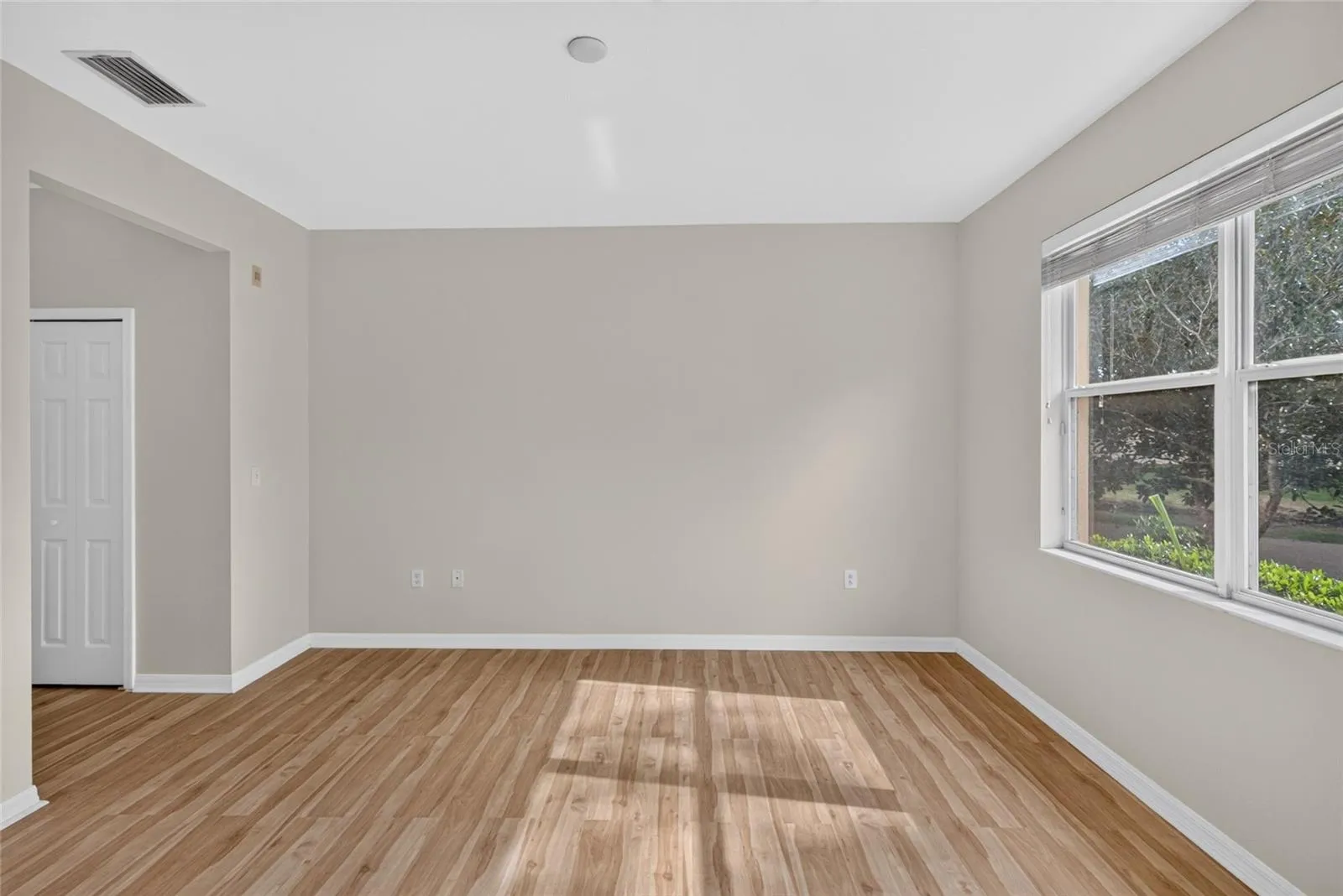 Primary bedroom with pond view