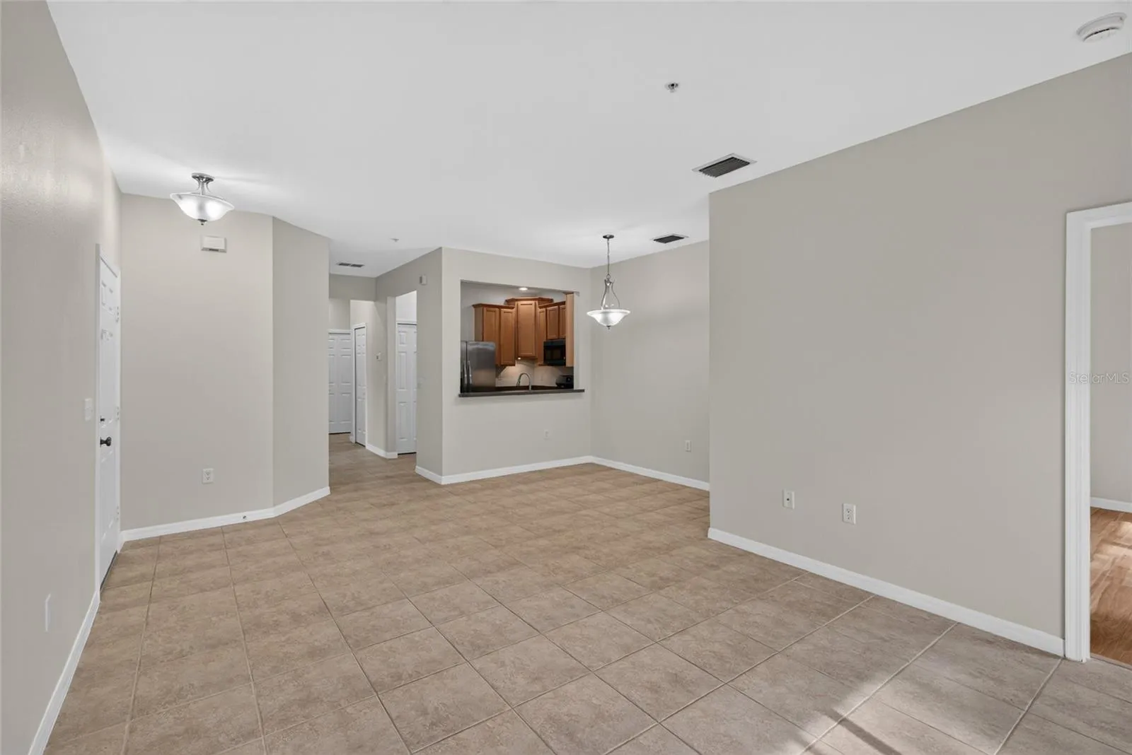 Open living and dining area, tile throughout