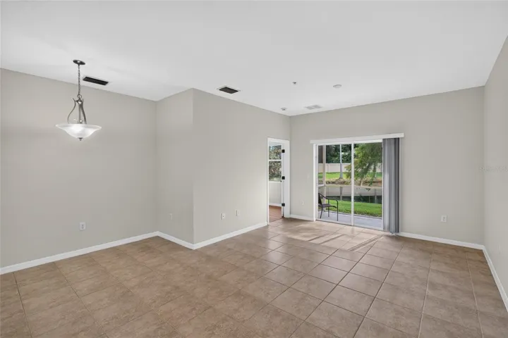 Dining area with sliders to the lanai