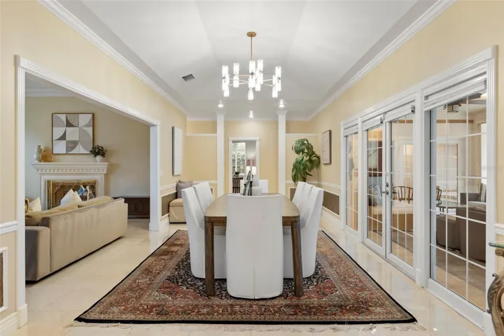Formal Dining Room with French Doors leading to Courtyard
