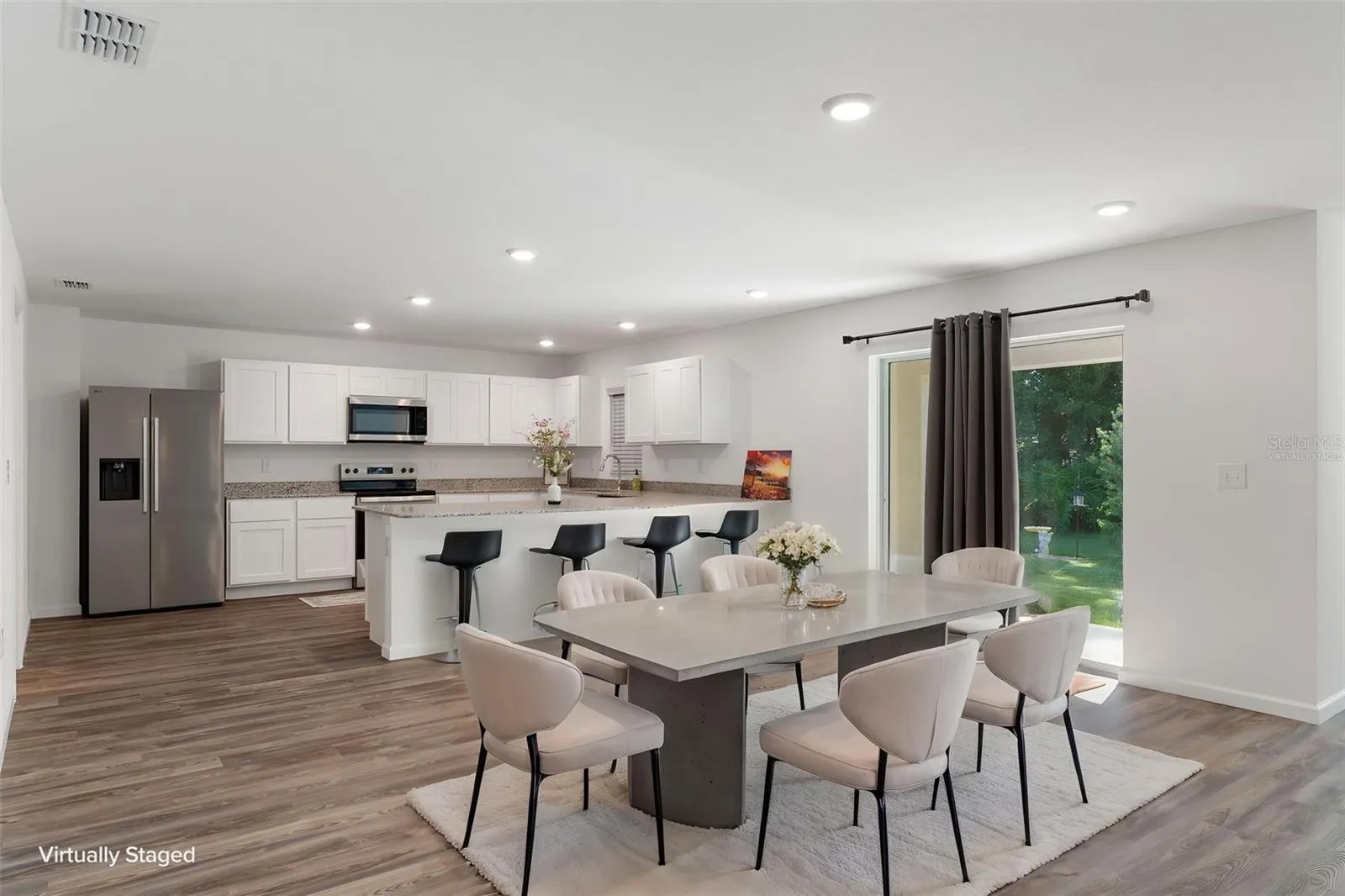 VIrtually Staged Dining Room and Kitchen