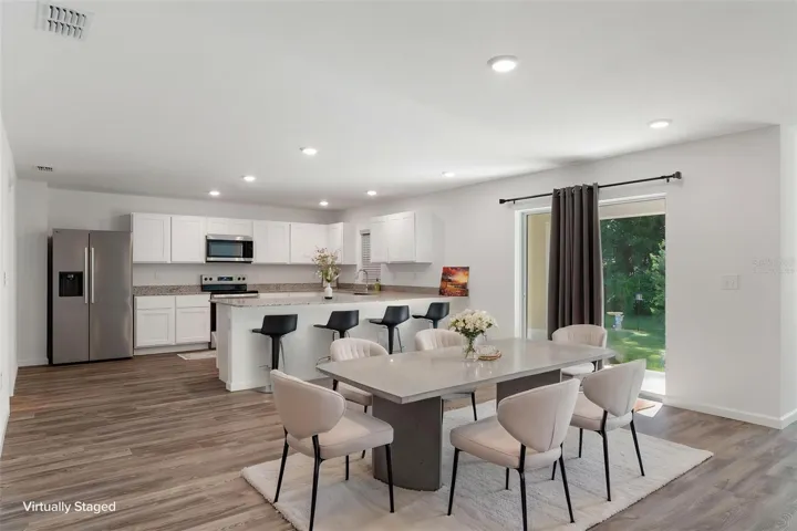 VIrtually Staged Dining Room and Kitchen