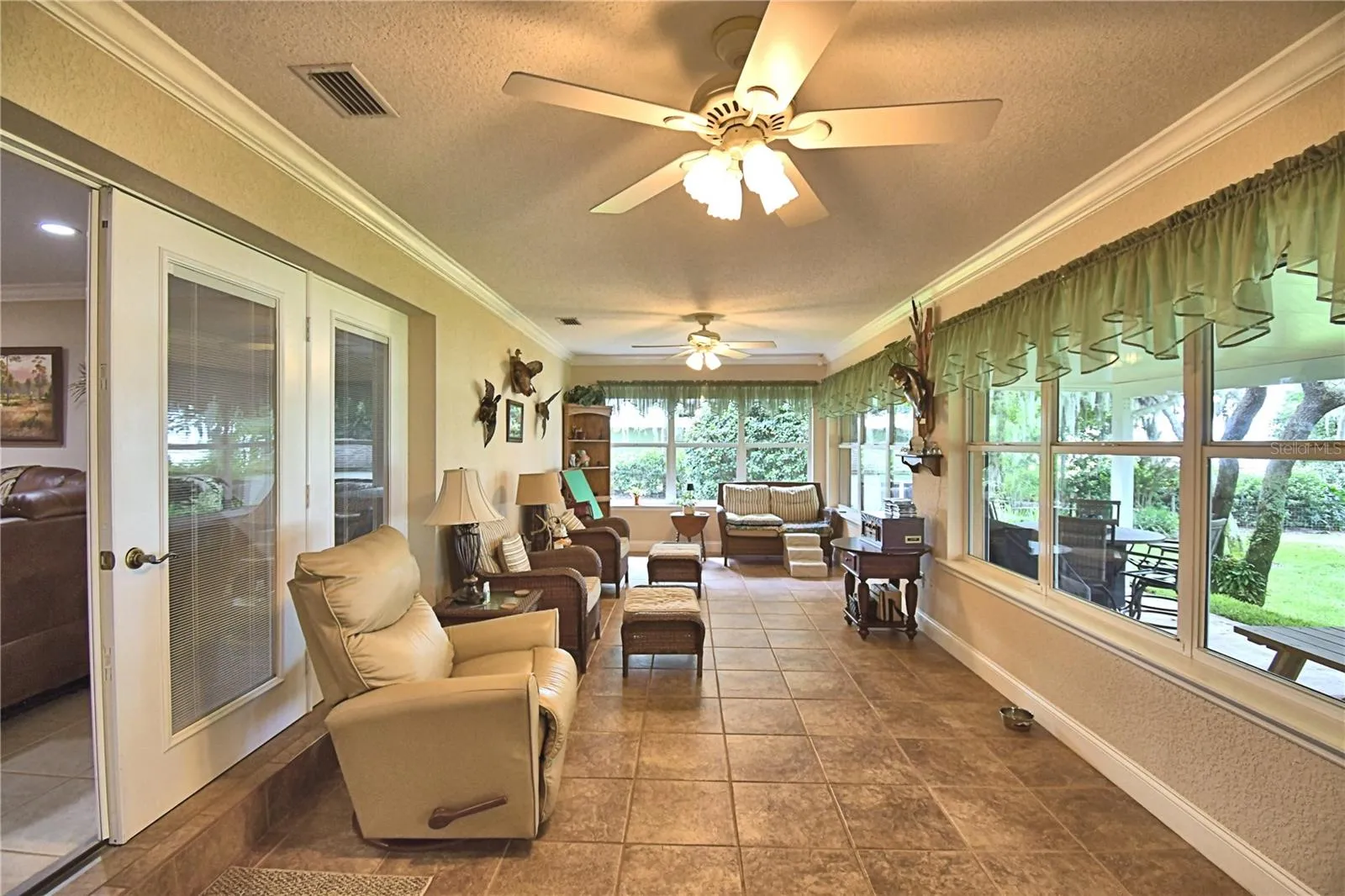FL Room, wall of windows, view of lake &amp; AC