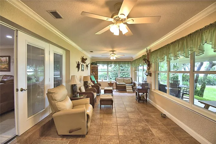 FL Room, wall of windows, view of lake &amp; AC