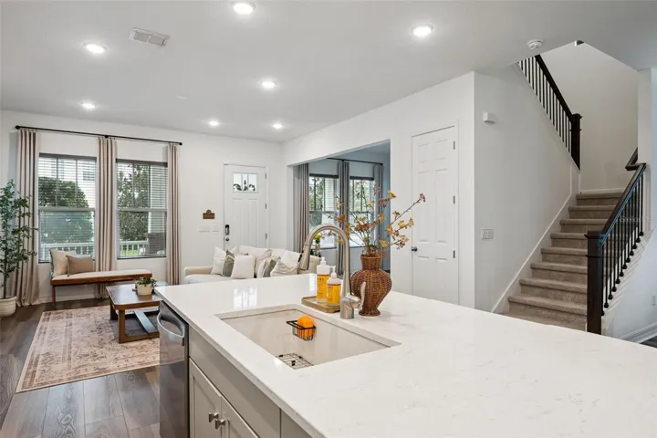 Kitchen Overlooks Living and Dining Rooms